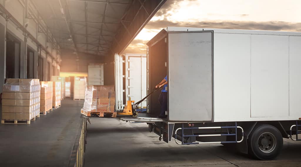 Trucks Parked Loading at Dock Warehouse
